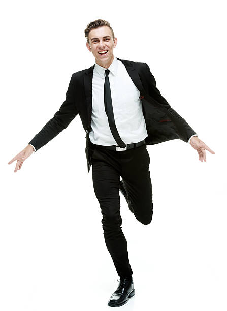 istock Cheerful businessman running with arms outstretched 516615279