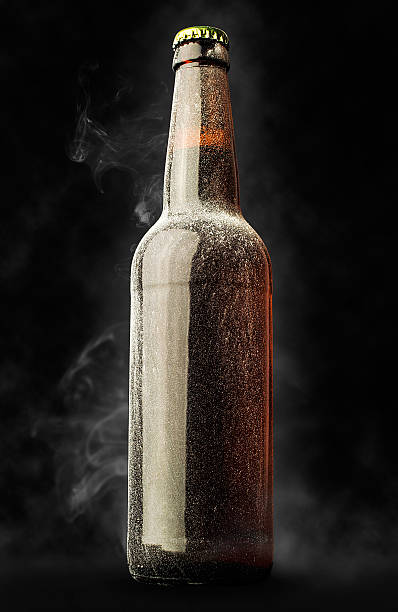 istock beer bottle in the frost with steam 516617701