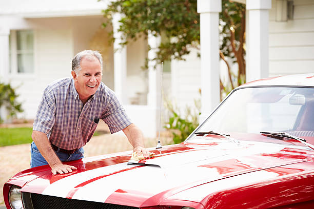 istock Retired Senior Man Cleaning Restored Car 516618137