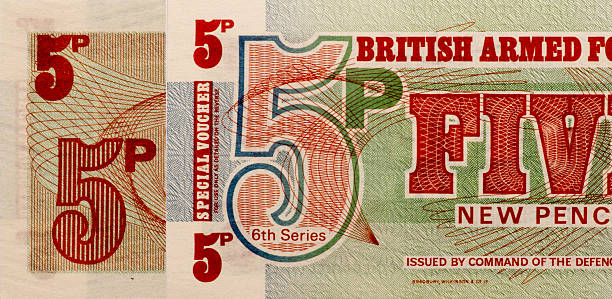 istock paper money British Armed Forces 5 Pence. 516621346