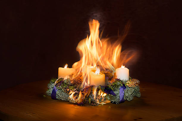 Advent wreath caught fire stock photo