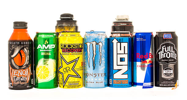Bunch of energy drinks  Winneconne, WI, USA - 27 July 2015:  Some of the biggest energy drinks on the consumer market. Red Bull, Monster, Amp, Rockstar, Full Throttle, NOS and Venom throttle photos stock pictures, royalty-free photos & images