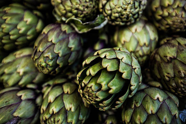 istock Pile of artichokes 516626704