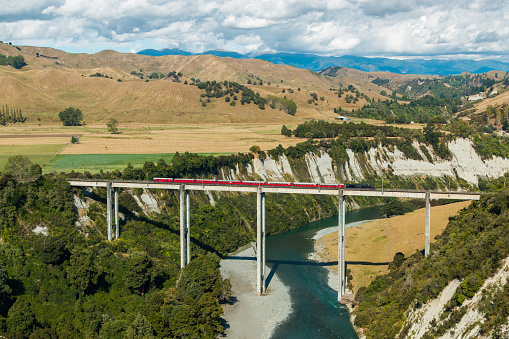 Stream train cross over one of New Zealand tallest trestle bridge over the Rangitikei river.