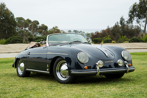 Dana Point, CA, USA - July 21, 2013: An angled perspective near the beach of an exceptionally rare and vintage Black Porsche 356B Convertible D 