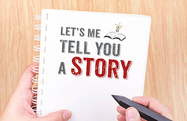 Let's me tell you a story work on white notebook