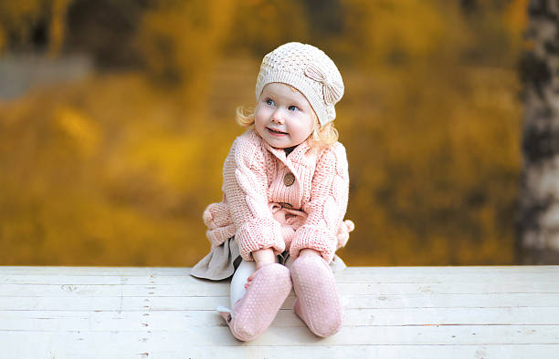 istock Autumn portrait child having fun 516633083