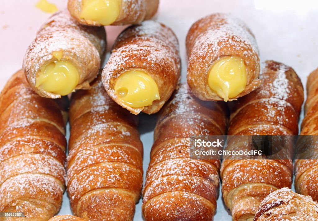 Large cannoli pastry with Sweet Cream Large cannoli pastry with Yellow Sweet Cream Calabria Stock Photo