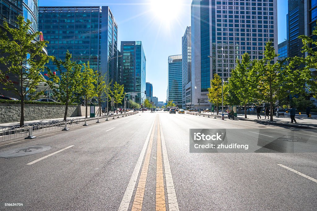 city road through modern buildings in beijing Midsection Stock Photo