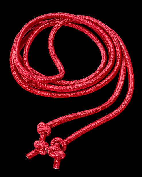 red rope in black back a rolled red rope in black back knurl stock pictures, royalty-free photos & images