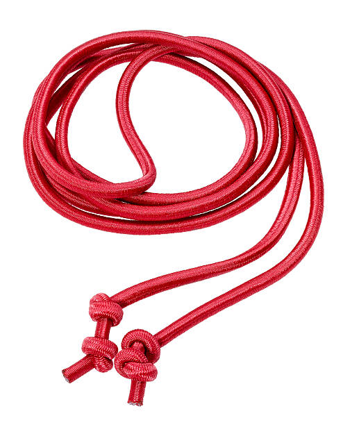 red rope in white back a rolled red rope in white back knurl stock pictures, royalty-free photos & images