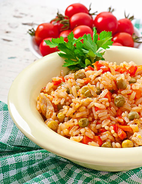 istock Pilaf with chicken, carrot and green peas 516635679