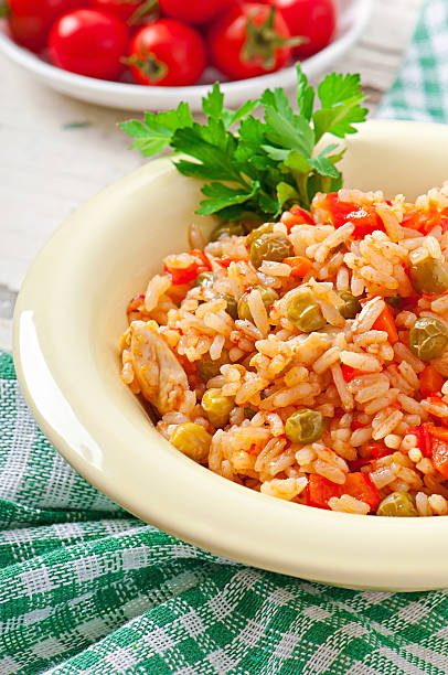 istock Pilaf with chicken, carrot and green peas 516635691