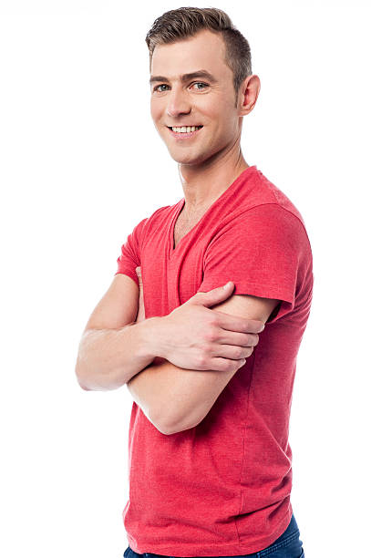 istock Happy young man, arms crossed 516635929