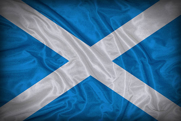 istock Scotland flag pattern on the fabric texture ,vintage style 516637271