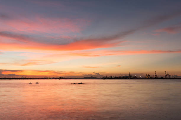 istock twilight of Laem Chabang seaside at Sriracha with sunset sky 516637579
