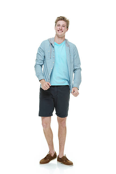 istock Front view of happy young man standing 516637643
