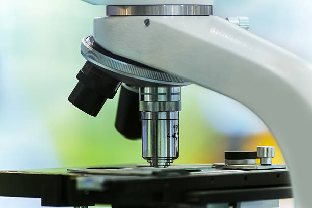 istock Laboratory Microscope. Scientific and healthcare research background 516637857