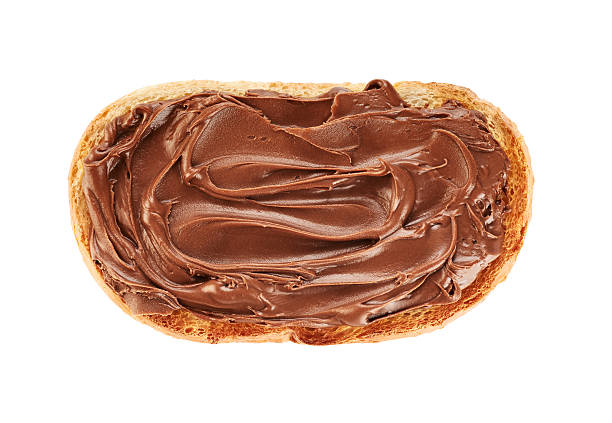 istock Toast with chocolate butter isolated on white background. 516645274