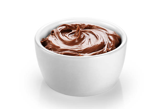 istock Bowl with chocolate butter isolated on white background. 516645290