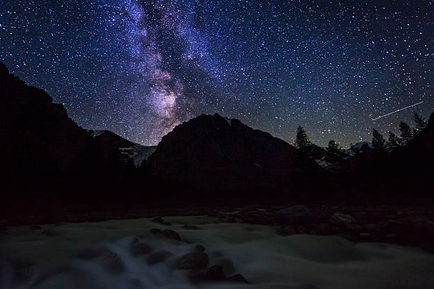 istock Amazing starry landscape with mountains and the river. 516645962
