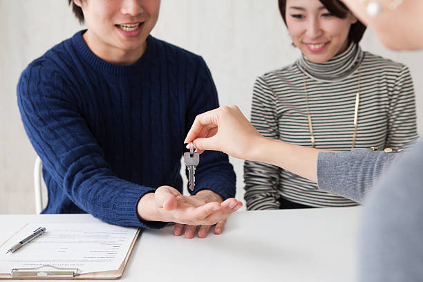 istock Couple have received a key from the real estate agent 516645998