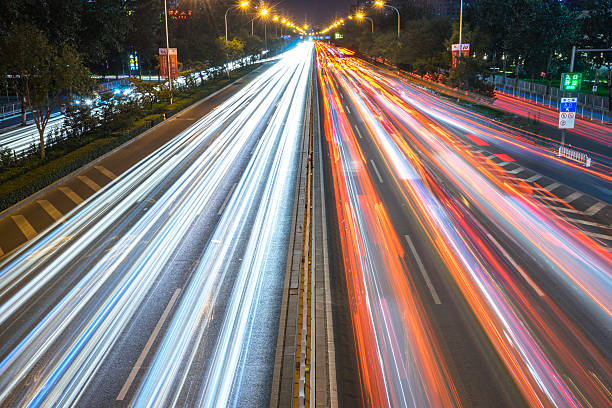 istock traffic on road and buildings in beijing 516646850