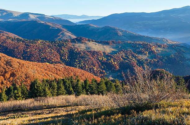 istock Morning fog in autumn Carpathian. 516649136
