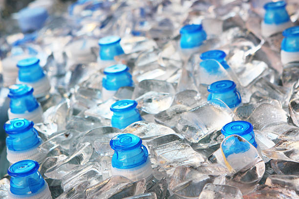 istock Water Bottles Ice Cubes Grocery Display 516650651