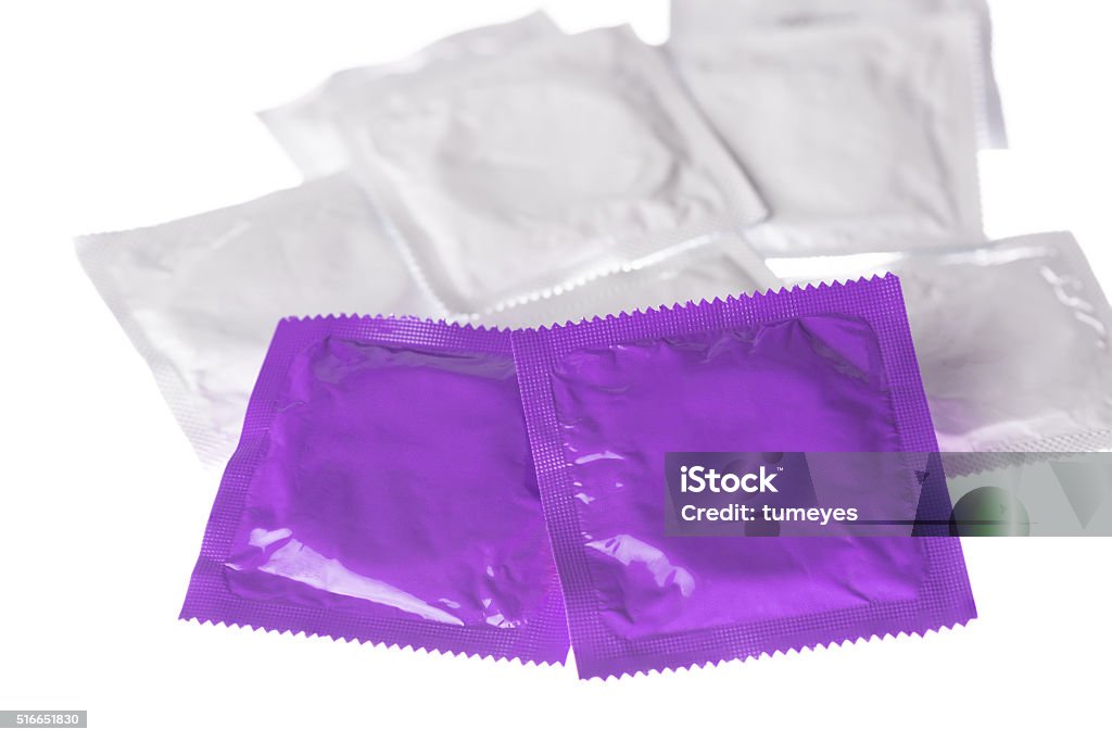 Condoms isolated on white background AIDS Stock Photo