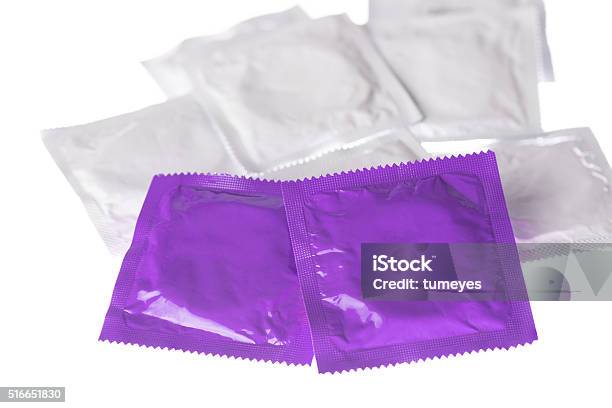 Condoms Isolated On White Background Stock Photo - Download Image Now - AIDS, Adult, Condom