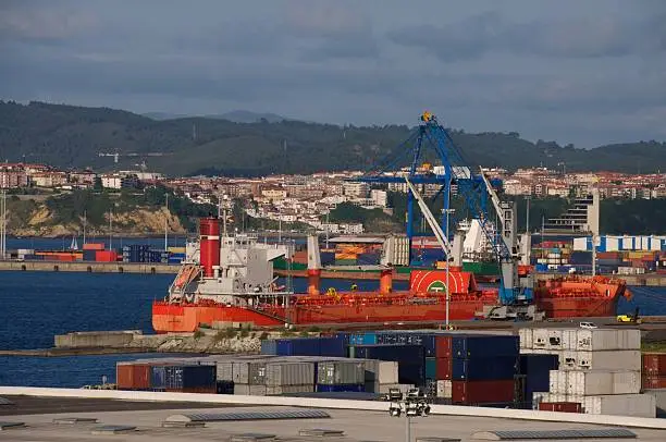 Merchant vessel in stowage operations at Bilbao harbor (Spain).
