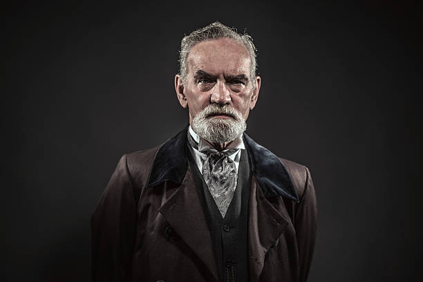 istock Vintage characteristic senior man with gray hair and beard. 516652191