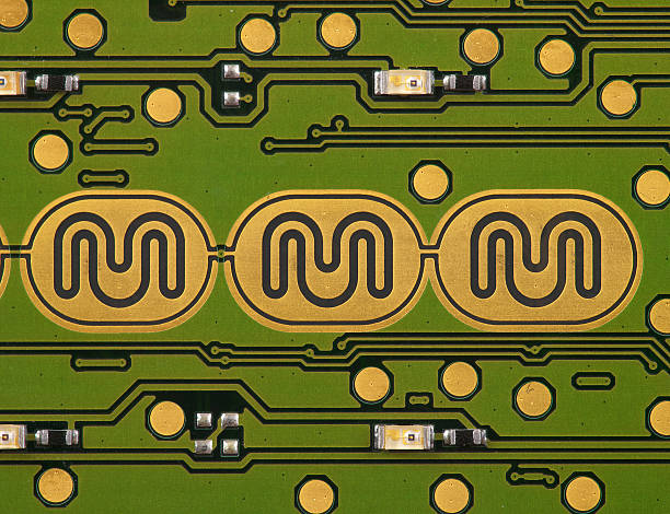 Printed circuit board with gold contact pads stock photo