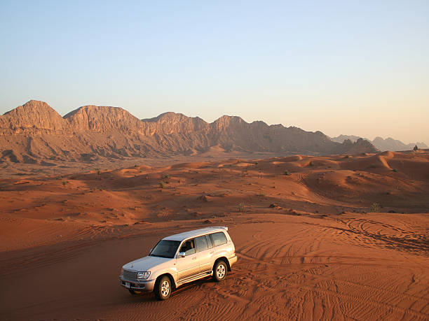 istock Car in the red Desert 516653023
