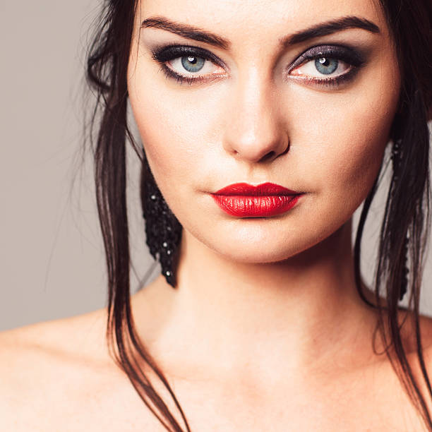 istock Contrast brunette with bright and bold make-up 516653716