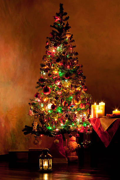 istock Lighted Christmas tree in living room 516654371