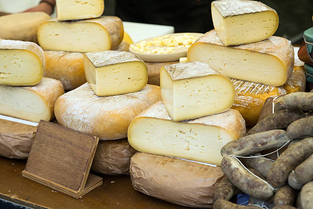 istock Cheese on market counter 516655364