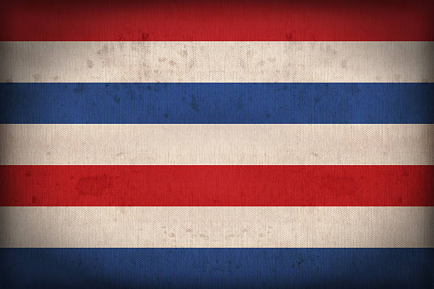 istock United Kingdom of Netherlands flag pattern on the fabric texture 516655723