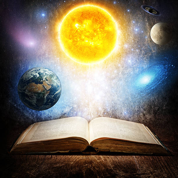Concept on the topic of astronomy or fantasy. Opened magic book with sun, earth, moon, saturn, stars and galaxy. Concept on the topic of astronomy or fantasy. Elements of this image furnished by NASA. astronomer photos stock pictures, royalty-free photos & images