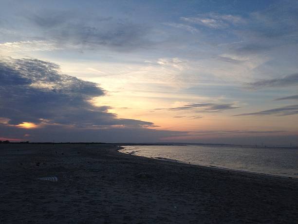 istock Sunset at Gunnison Nude Beach in Sandy Hook, NJ. 516656142