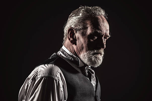 istock Vintage characteristic senior man with gray hair and beard. 516656169