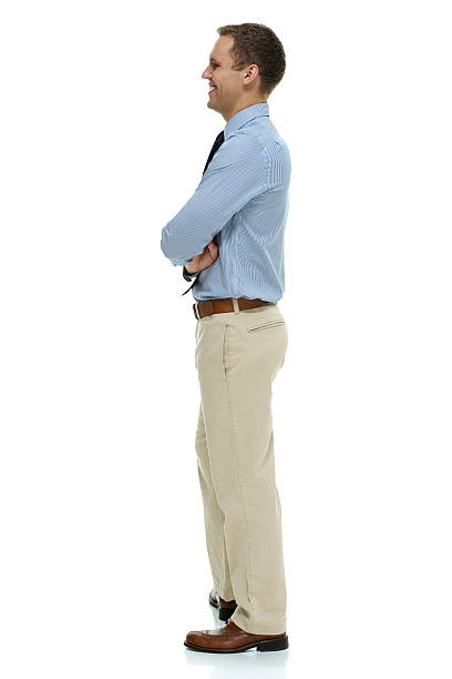 istock Cheerful businessman standing with arms crossed 516656477