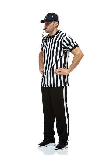 Isolated Portraits-Afro American Male referee signaling a touchdown.