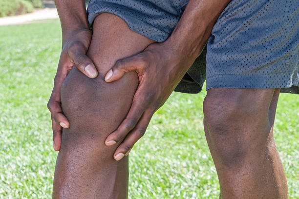 Knee injury closeup stock photo