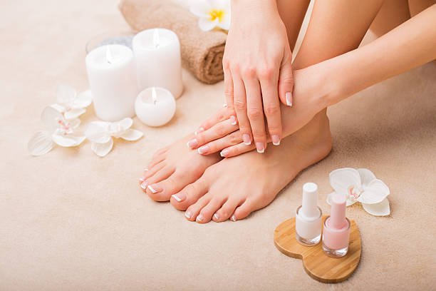 istock Women at spa salon after manicure and pedicure 516657298