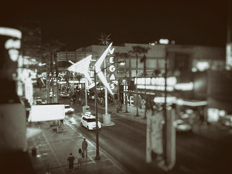 Monochromatic mobile photo of downtown Las Vegas, treated for vintage effect.