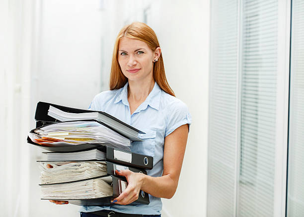 istock business woman on work place 516659082