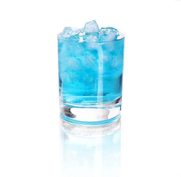 istock glass with blue water and ice 516679164