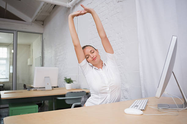 istock Businesswoman stretching hands in office 516680815